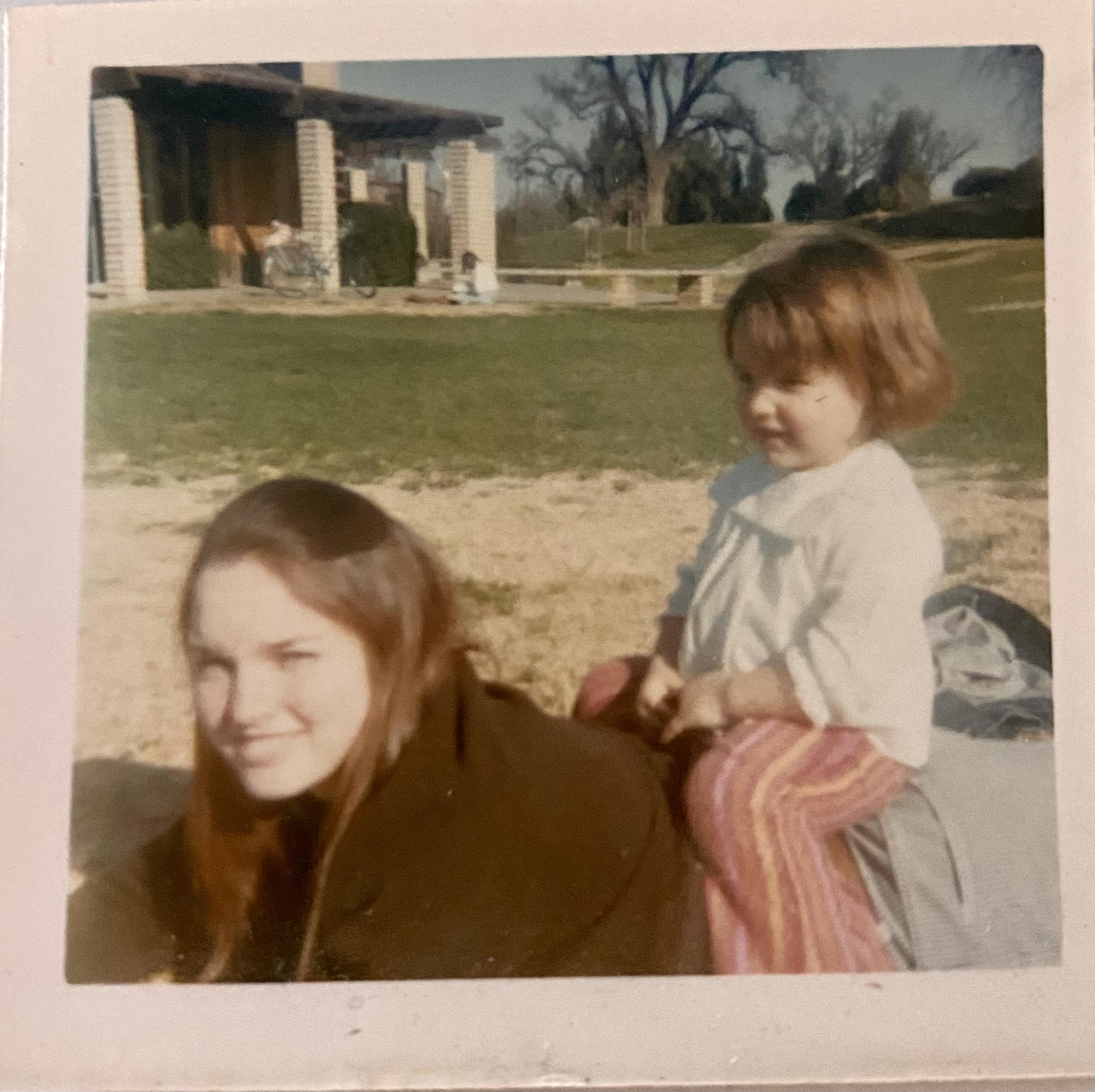 Raquel Silva on her mother's back
